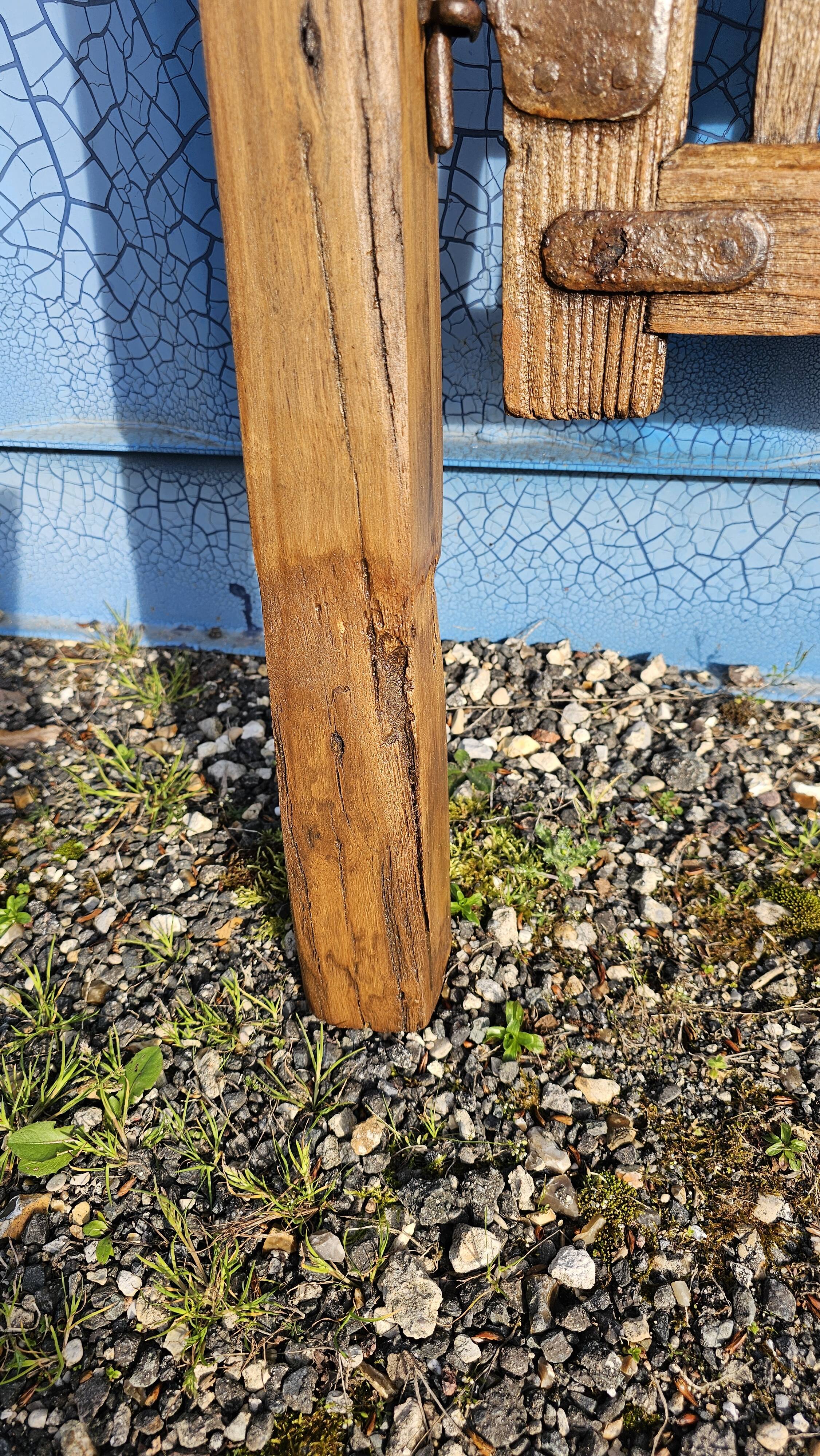 Old garden gate in solid teak