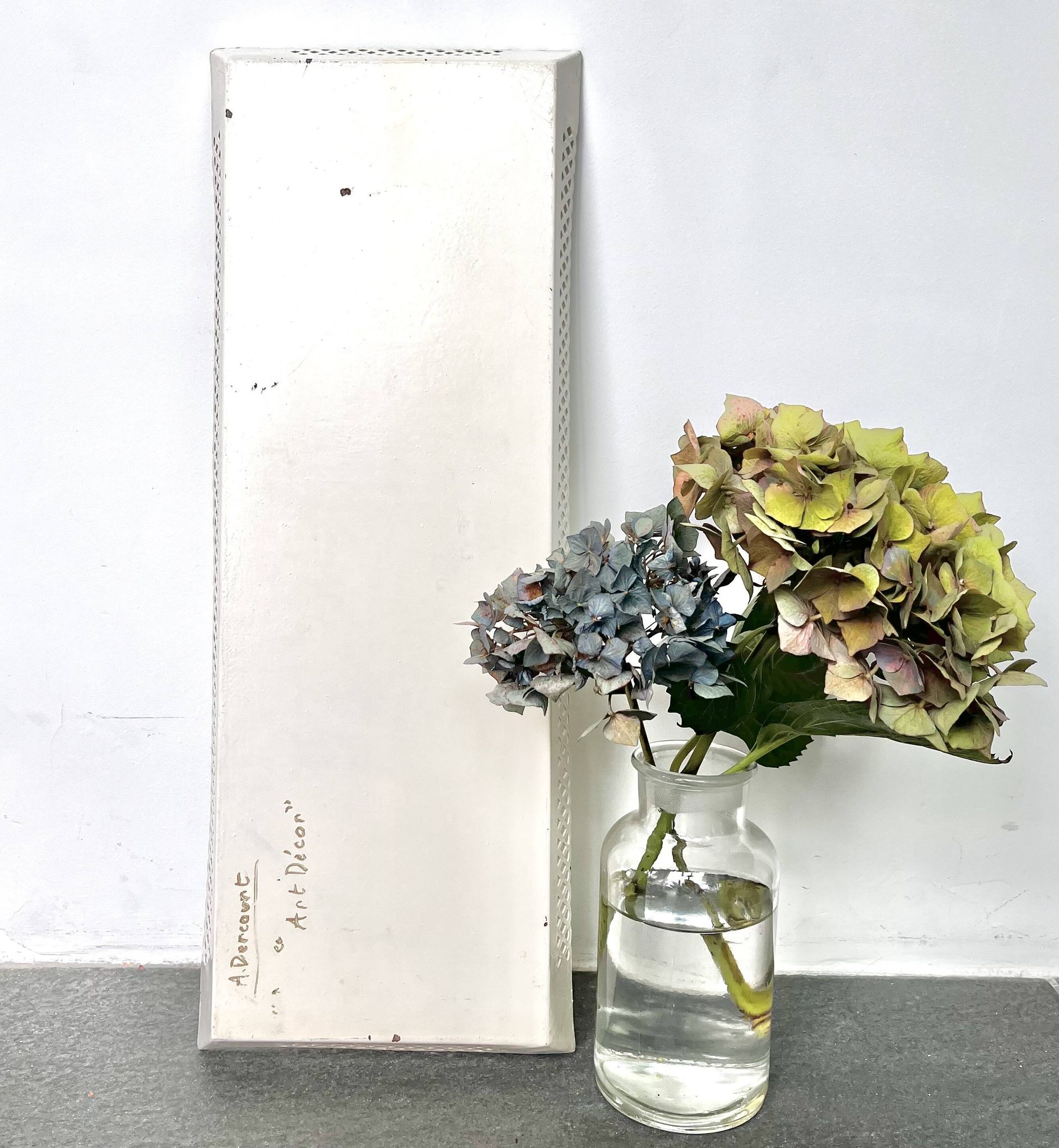 Large painted sheet metal tray with flower decoration
