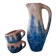Set of artisanal pitcher and weathered cups