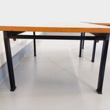 Suite of two vintage modernist Isa coffee tables in teak and black metal from the 60s