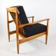Black boucle chair, Danish design on the cushions, 1970s.