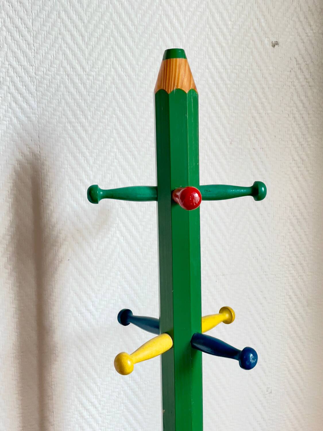 Pencil coat rack for children by Pierre Sala.