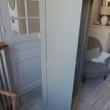 Vintage furniture transformed into a bookcase, verdigris patinated sideboard.