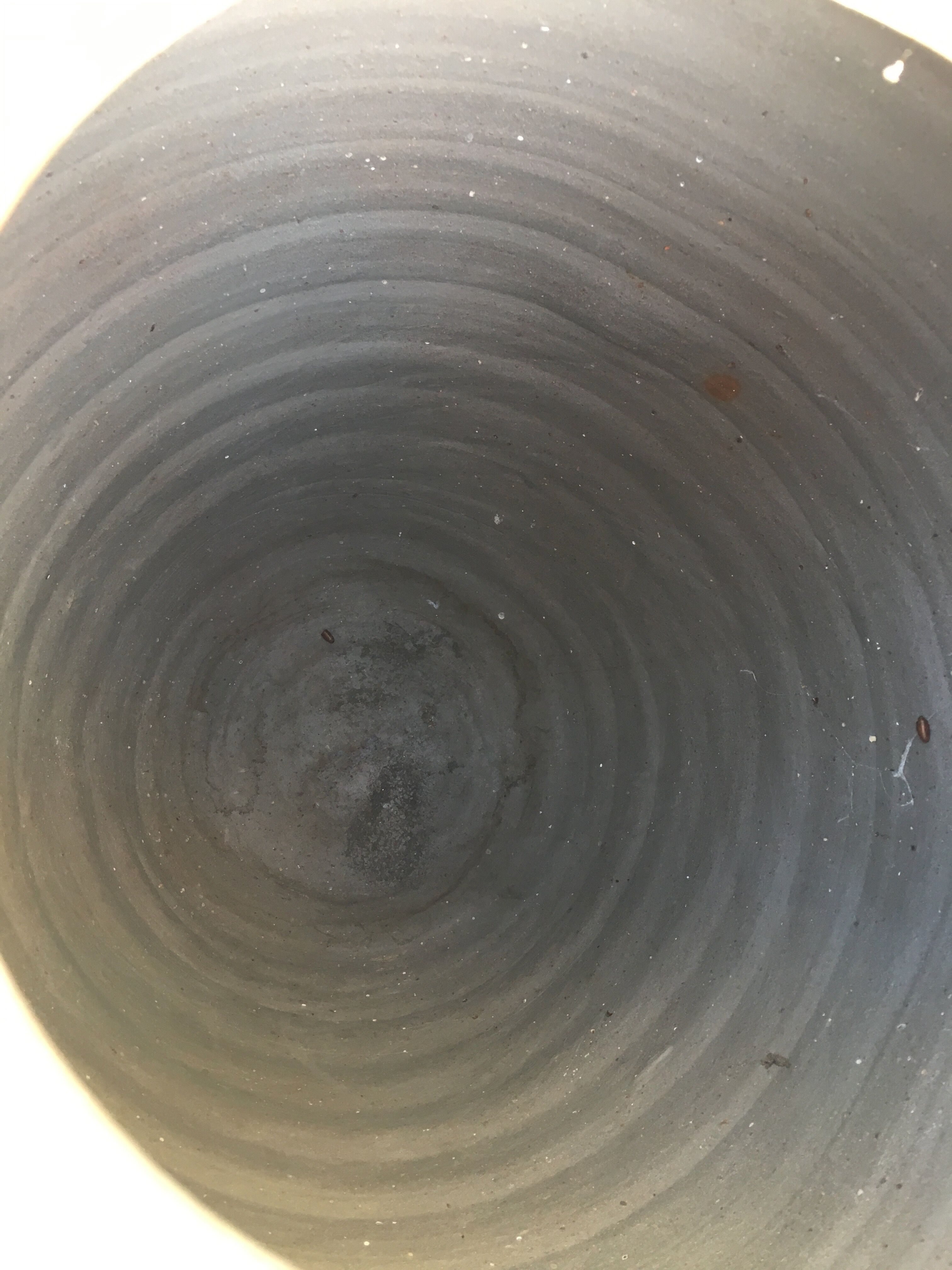 Old jug with two sandstone handles