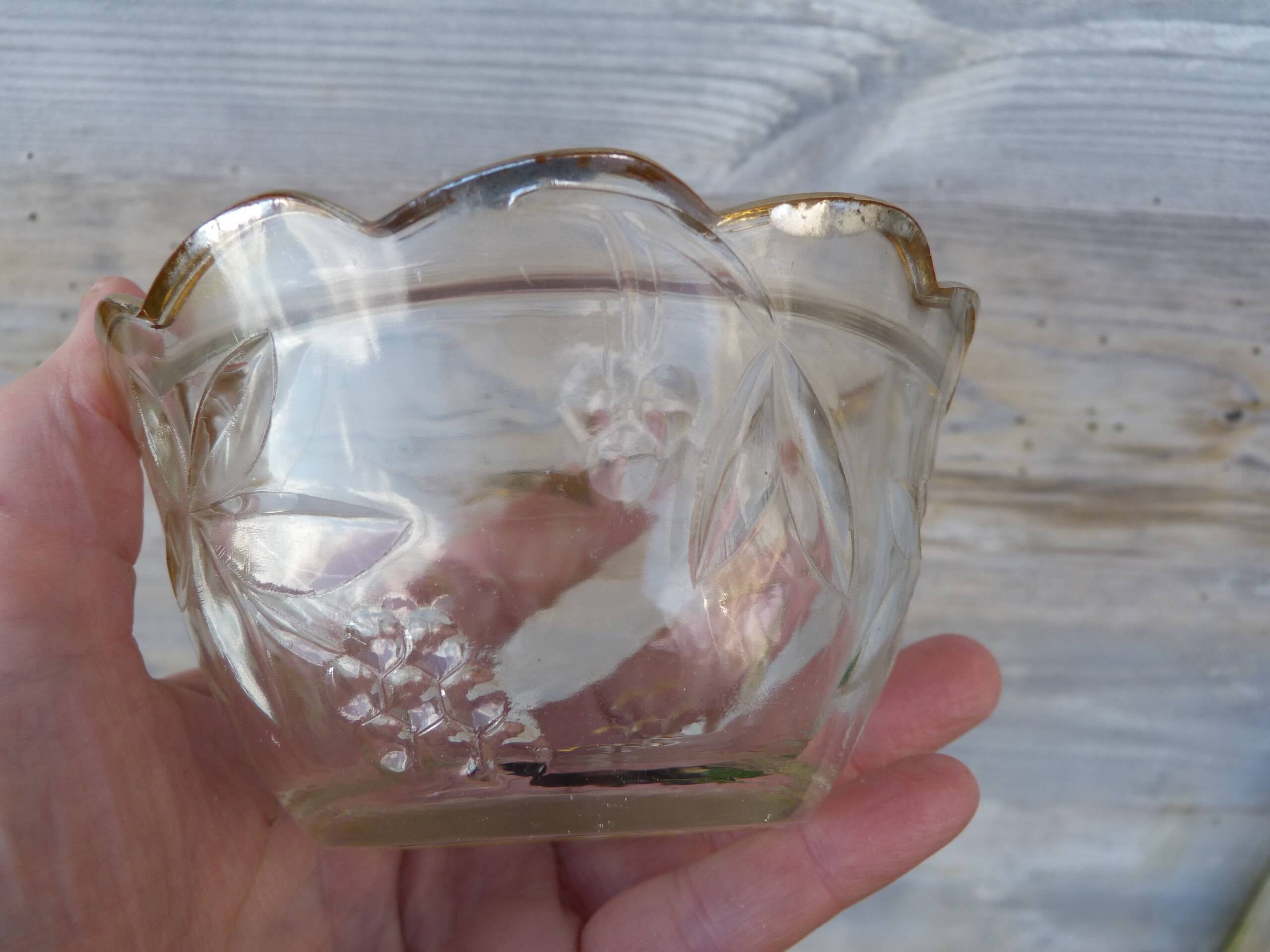 Cut glass candy box with golden edge