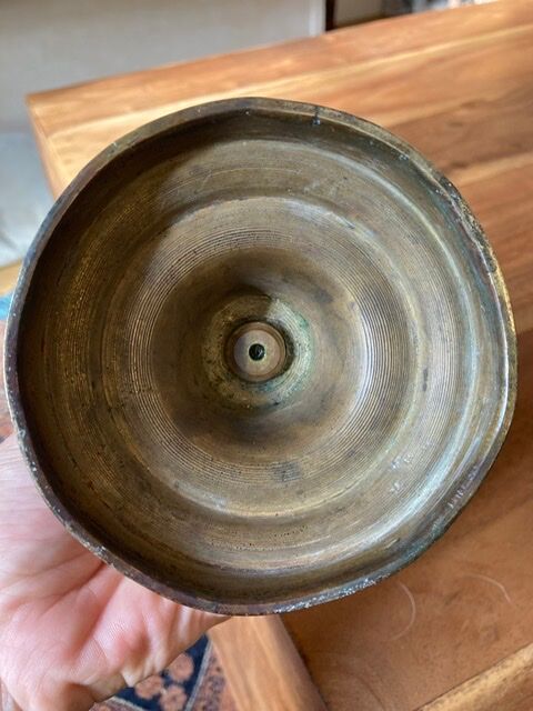 19th century brass candlestick says "to binet"