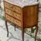 Charming small chest of drawers in precious wood marquetry.
