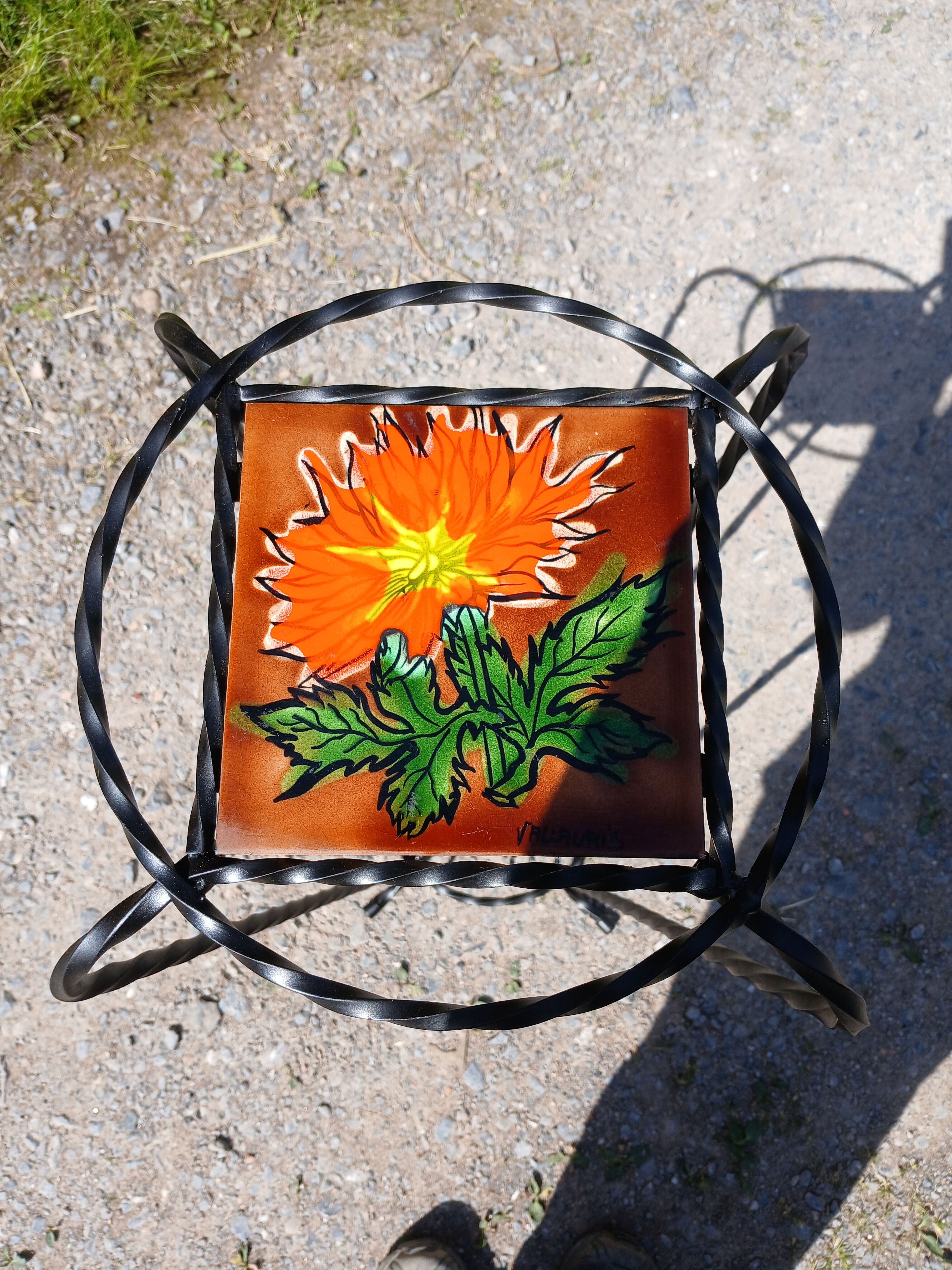 Vintage plant stand with Vallauris pottery.