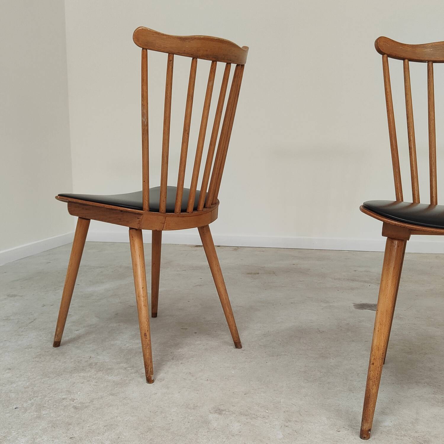 Set of 4 Baumann Menuet chairs black leatherette compass legs