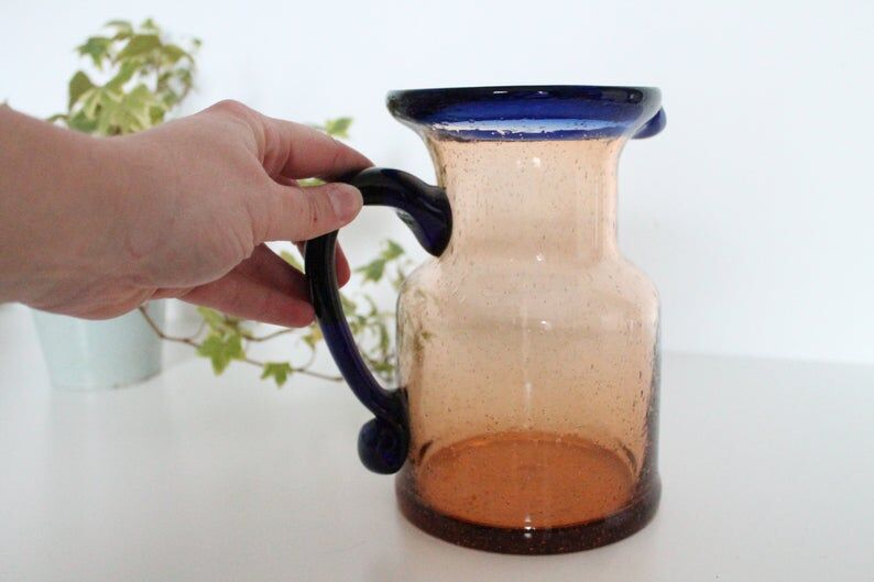 Bubble glass jug made by French craftsmen, blue and orange