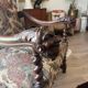 Antique armchair in Henri II style with masks
