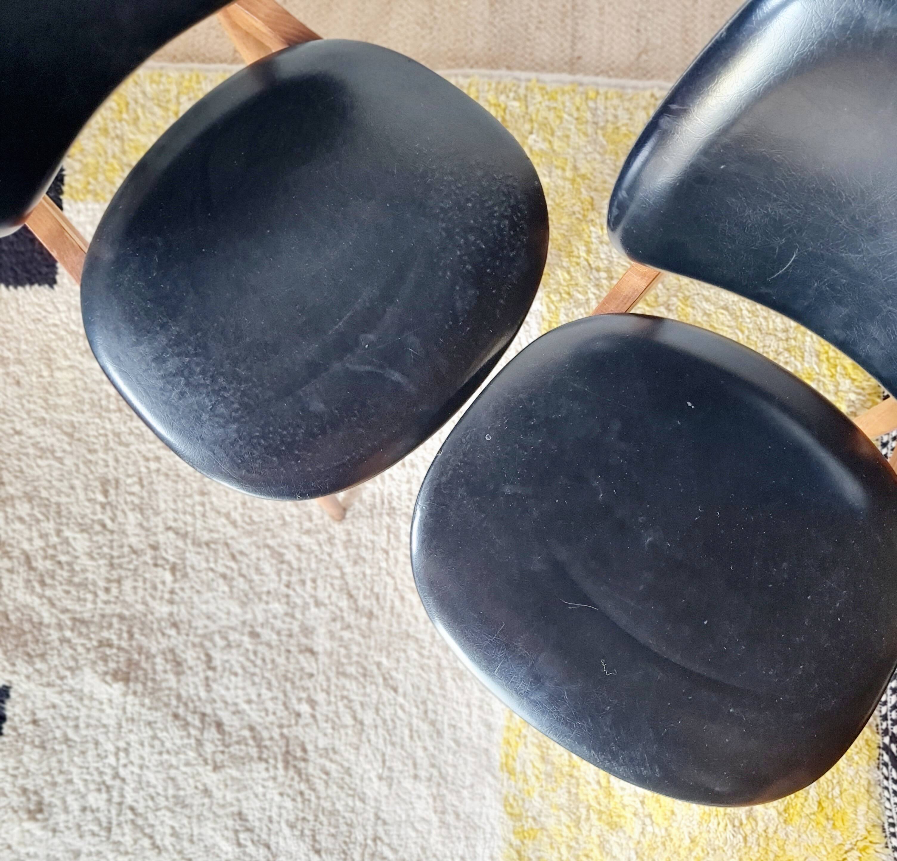 Pair of vintage 1960 chairs – Tapered legs & Black faux leather