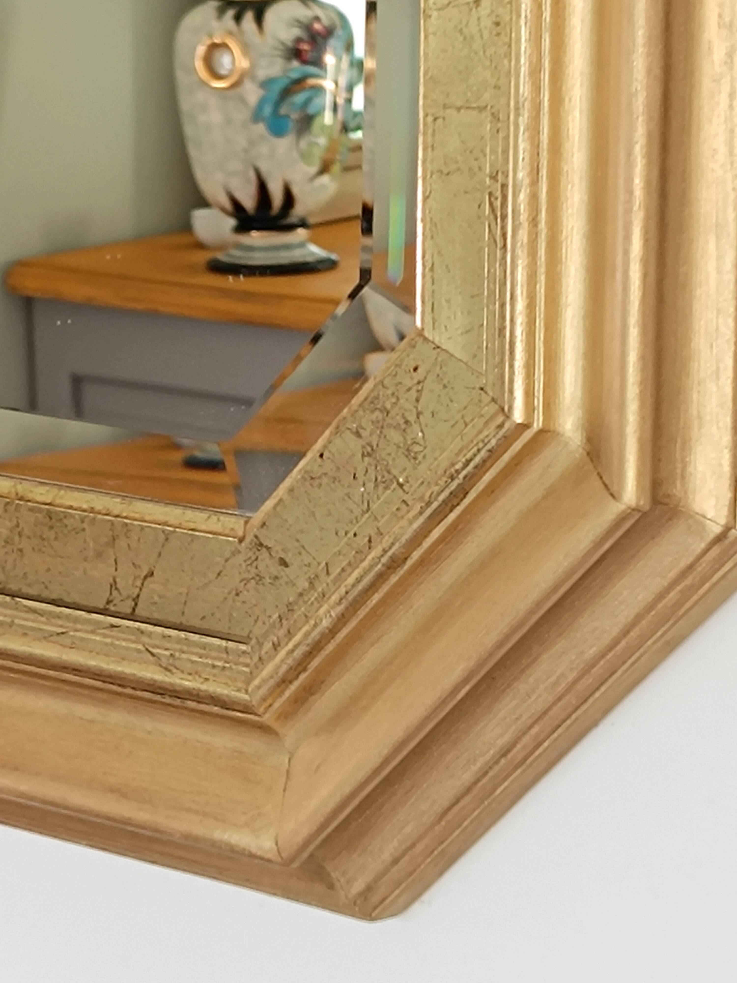Octagonal gilded wooden mirror