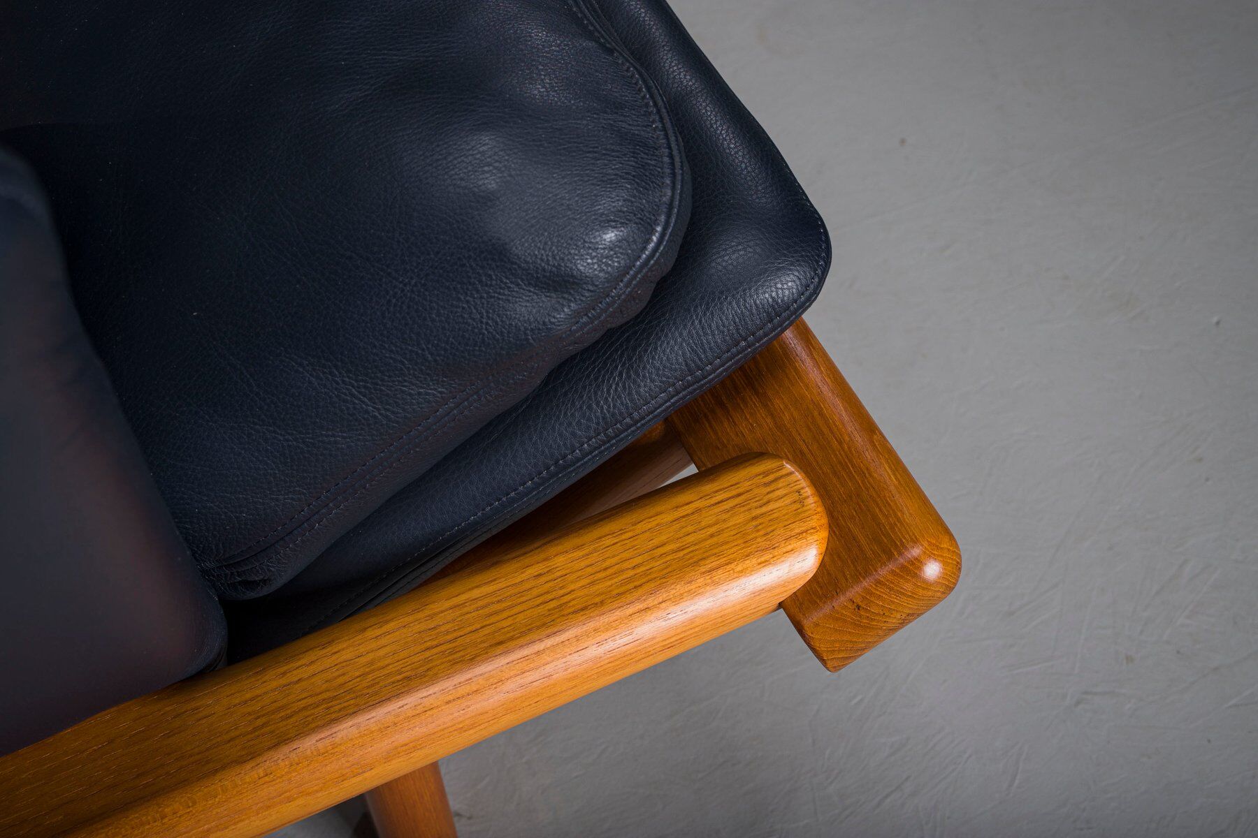 Danish teak and navy blue leather 3-seater sofa from Komfort, 1970s
