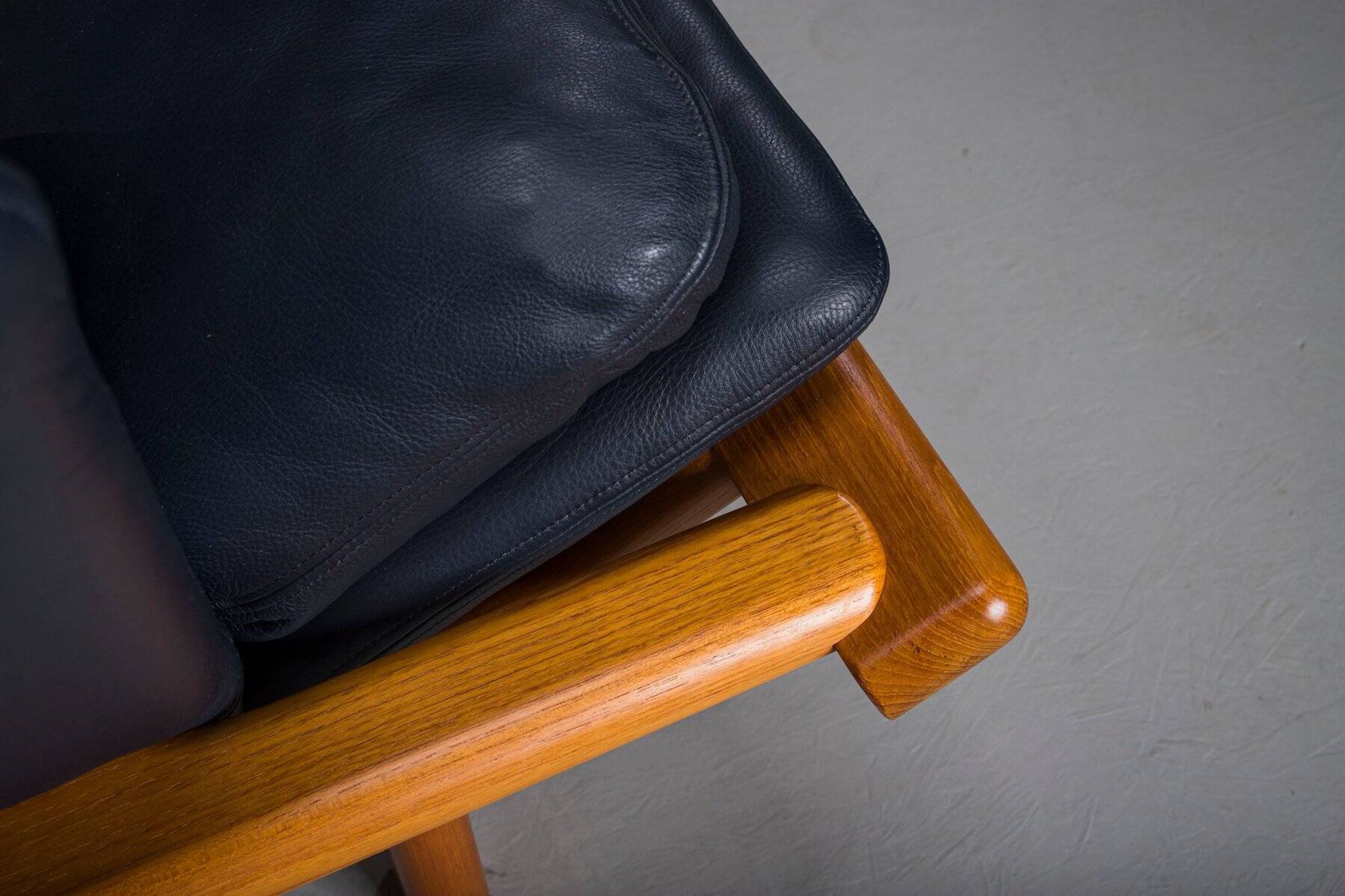 Danish teak and navy blue leather 3-seater sofa from Komfort, 1970s