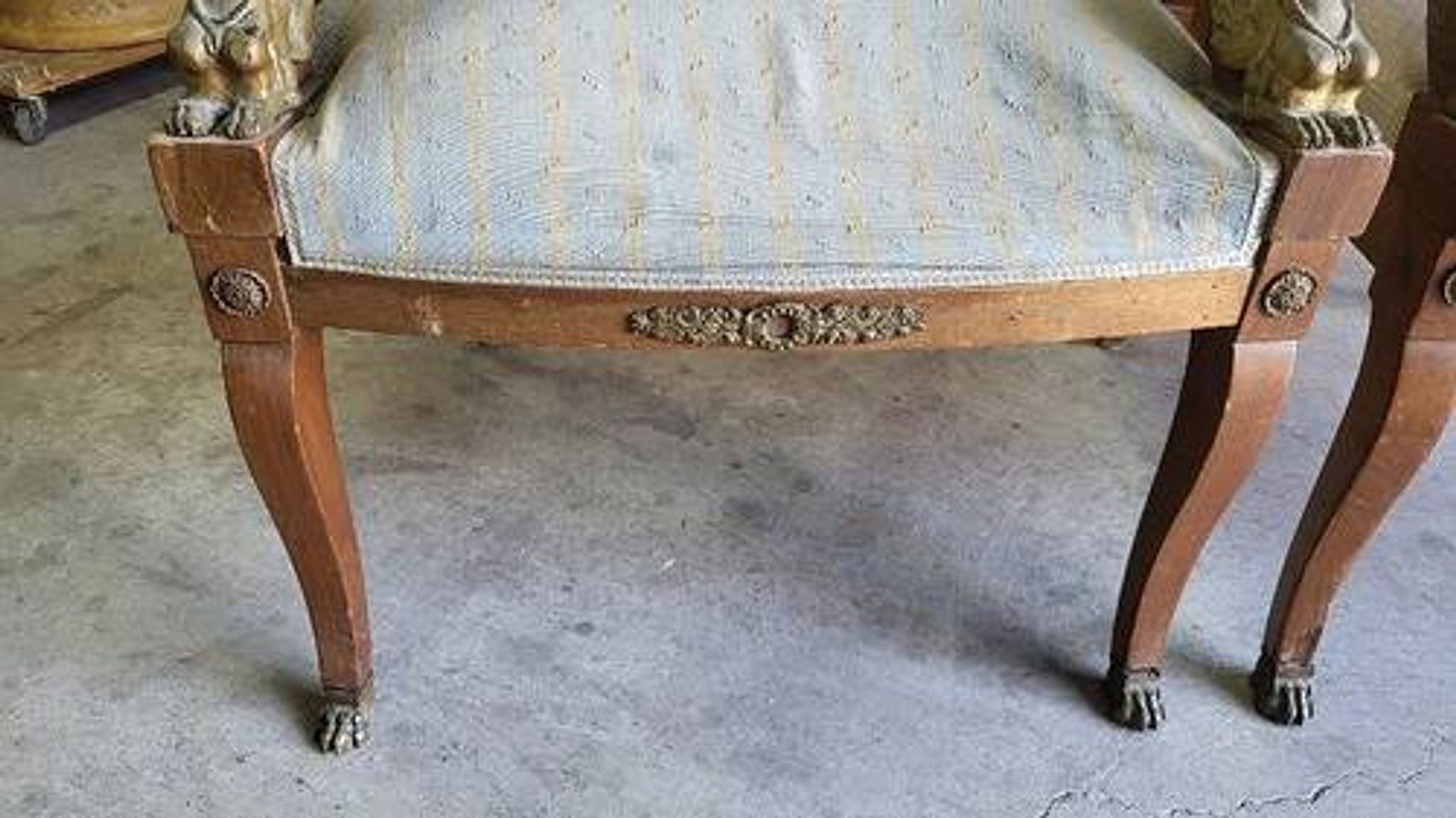 Pair of walnut armchairs in Empire style, Egyptian revival.