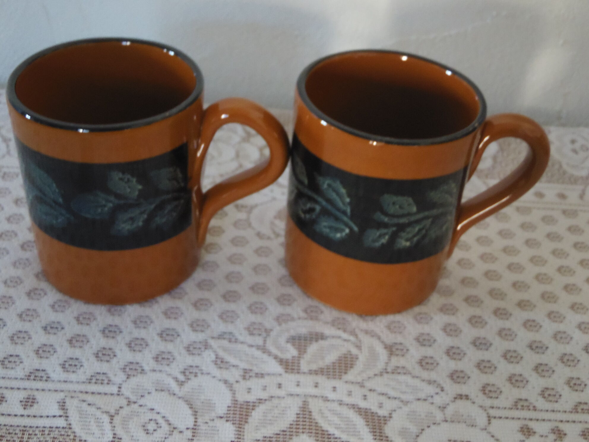 2 glazed terracotta mugs