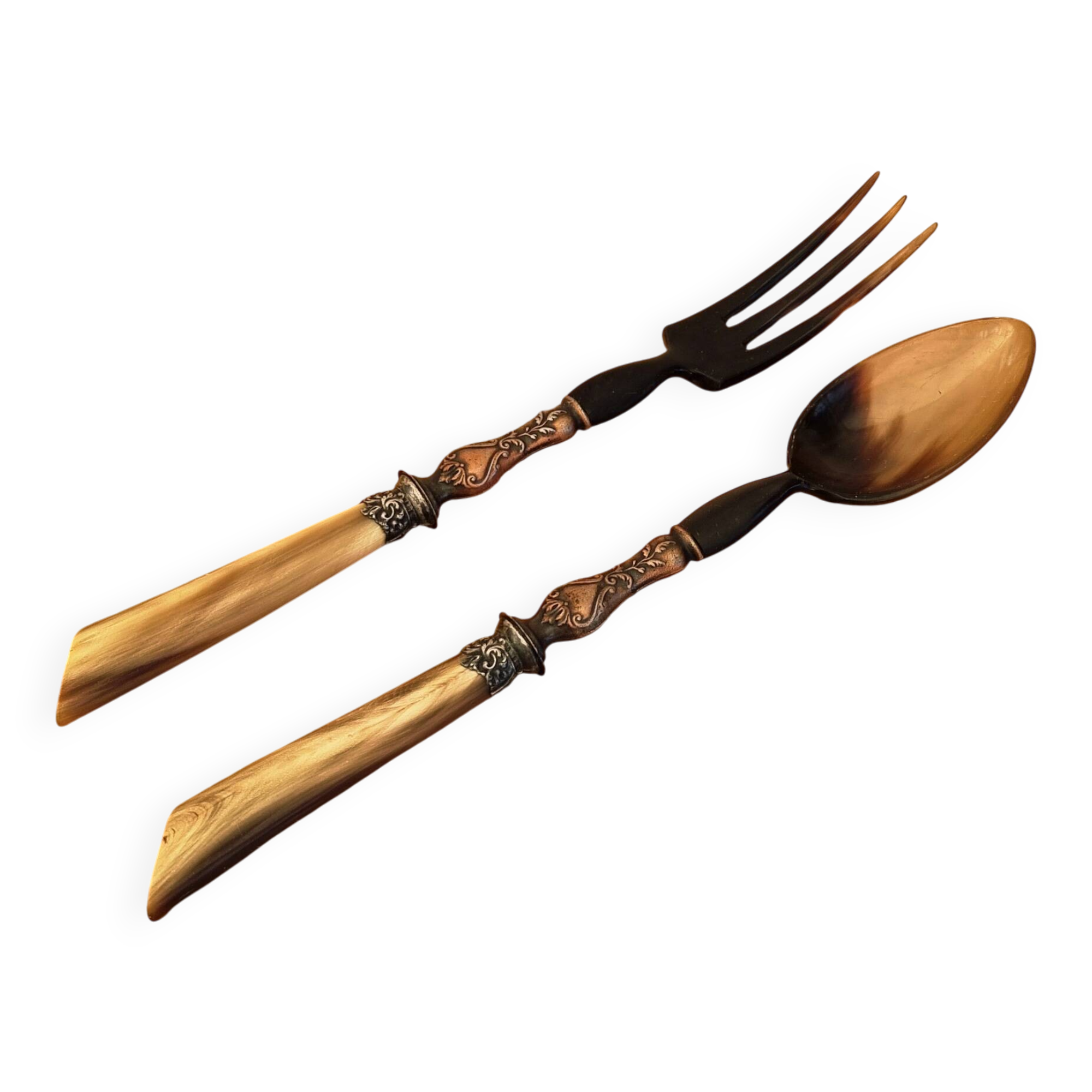 Vintage serving cutlery in horn and wrought metal