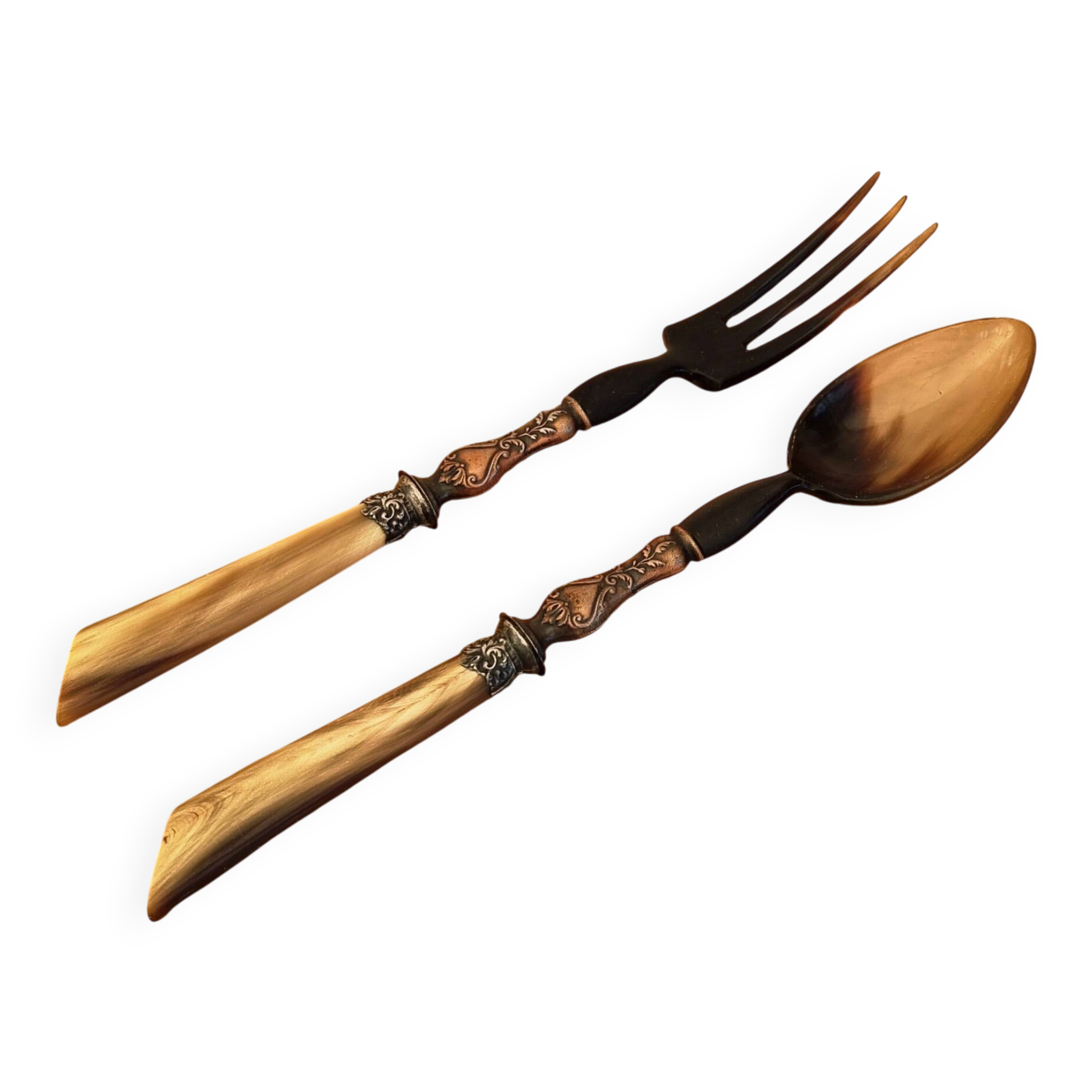 Vintage serving cutlery in horn and wrought metal