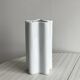 Modern white ceramic vase with wavy curves