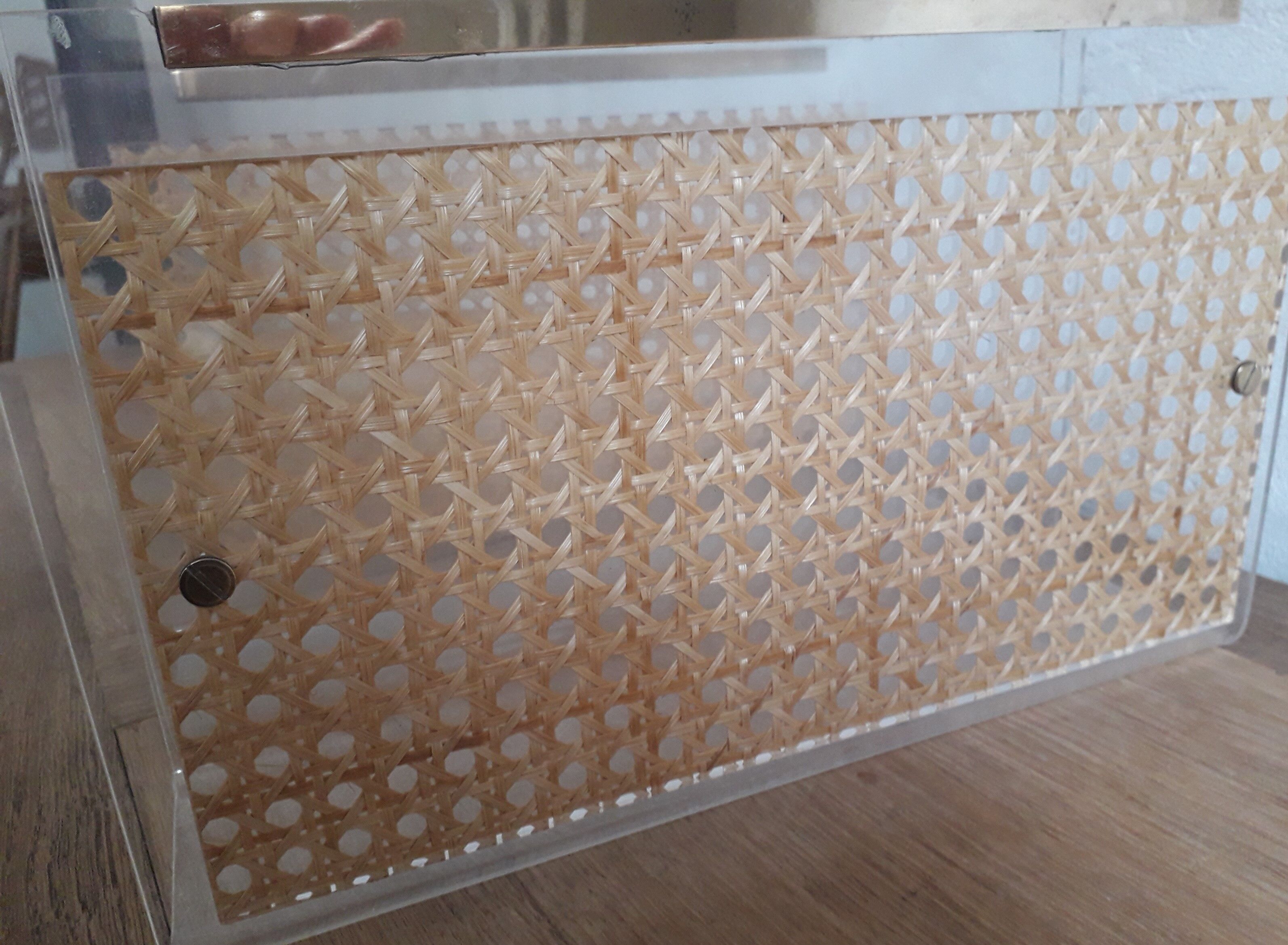 Plexiglas and cannage magazine holder