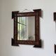 Pair of wooden mirrors in tramp art style