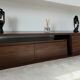 Extendable TV cabinet with walnut finish