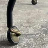 Black brass and glass mid-century trolley with sculptural legs — two-tier vintage bar cart