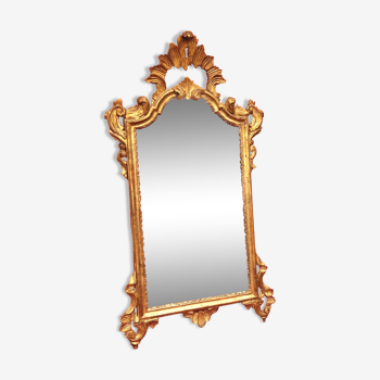 Miroir en bois doré de style rocaille