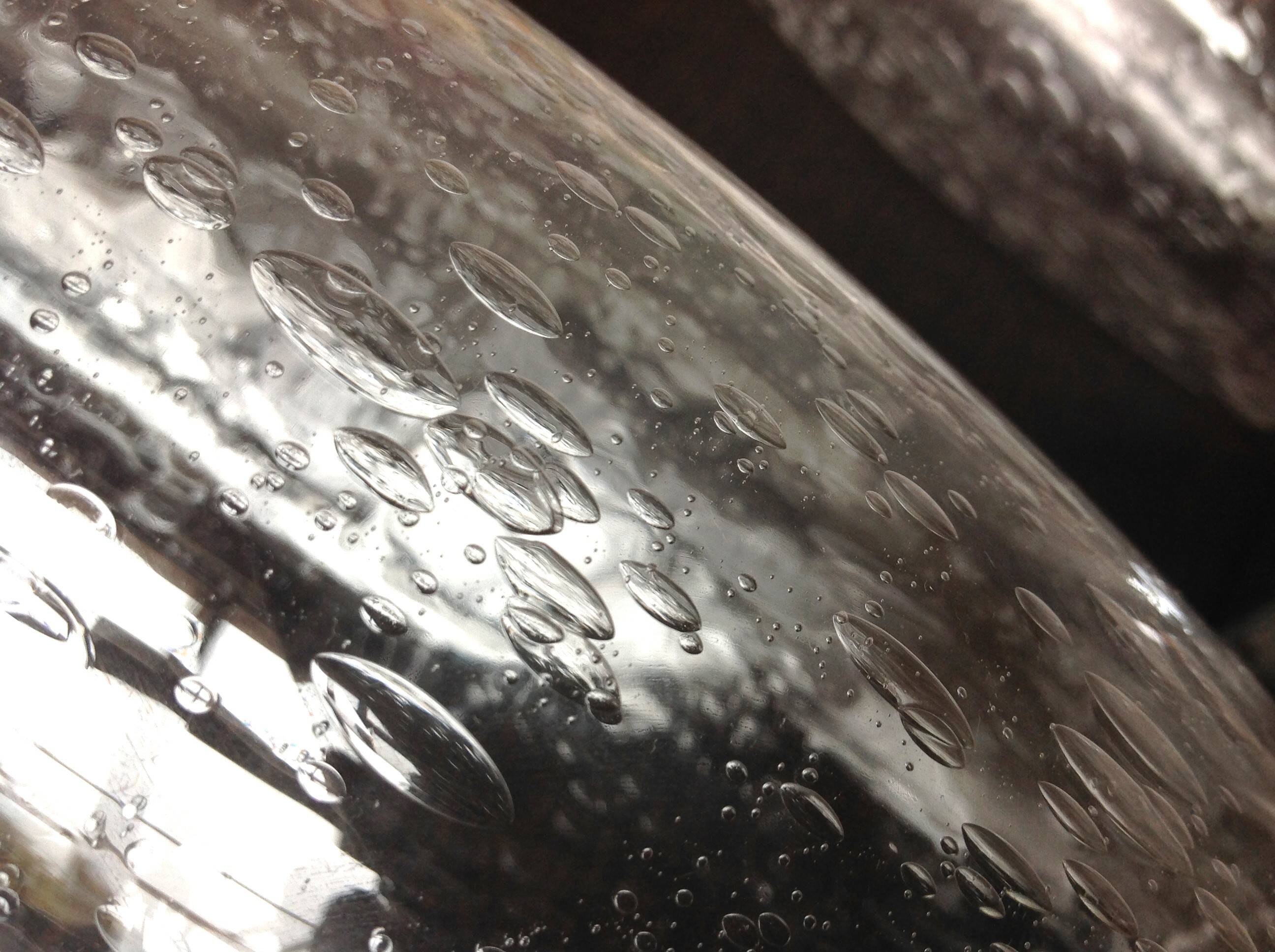 Pair of vintage 1970s-80s glass and chrome wall lights with teardrop shapes