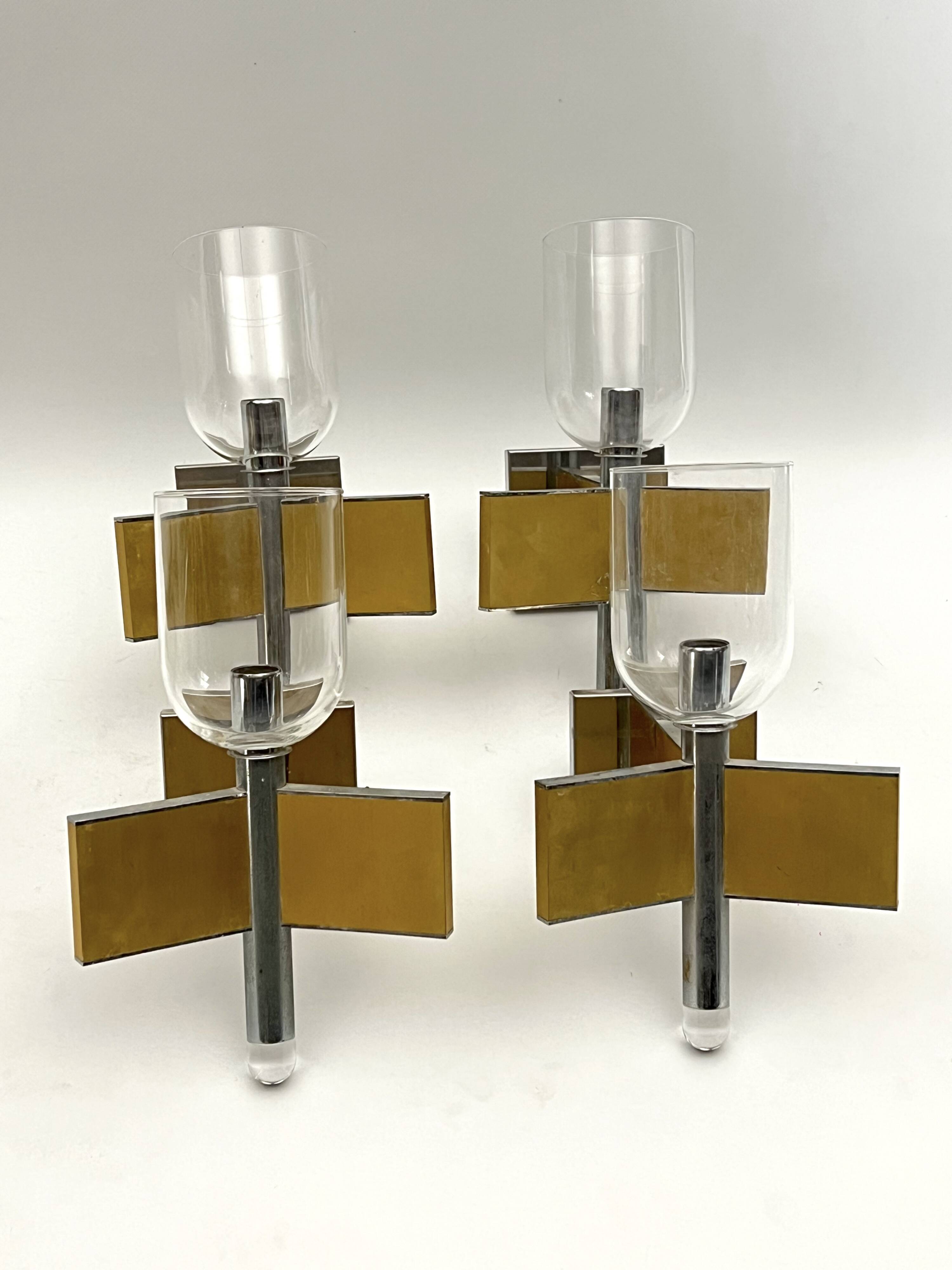 Mid-Century Modern set of eight brass and chrome sconces by Sciolari. Italy 1970s