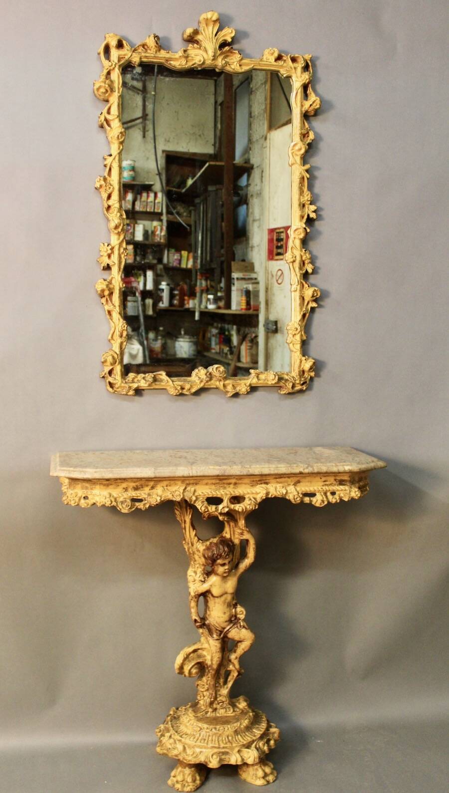 Marble top console and its rocaille style mirror