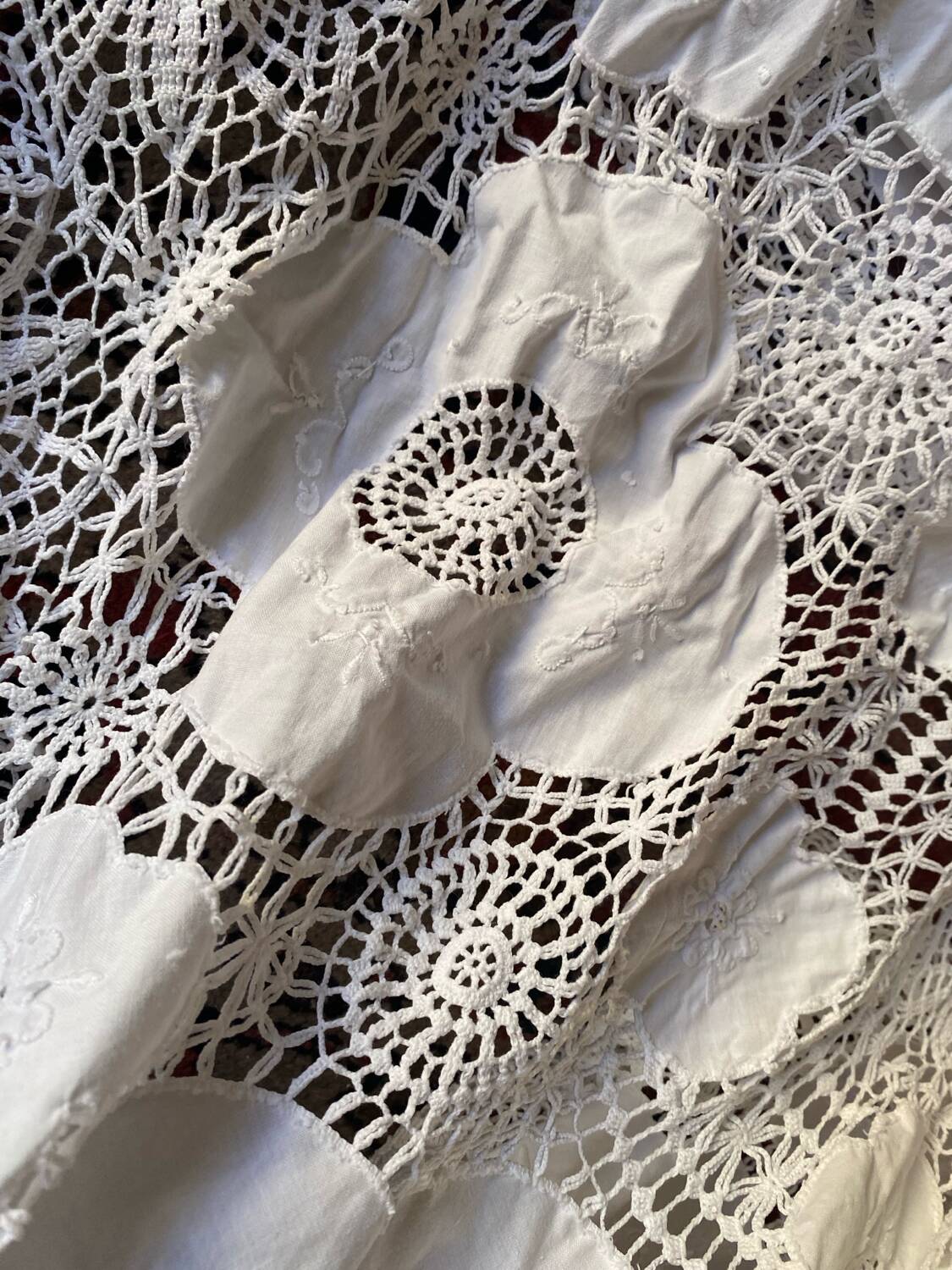 White cotton tablecloth with crochet lace.