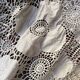 White cotton tablecloth with crochet lace.
