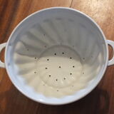 White porcelain strawberry strainer or drainer