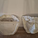 Pair of white glazed ceramic wall planters