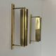 Pair of vintage adjustable brass wall lights, France, 1960s