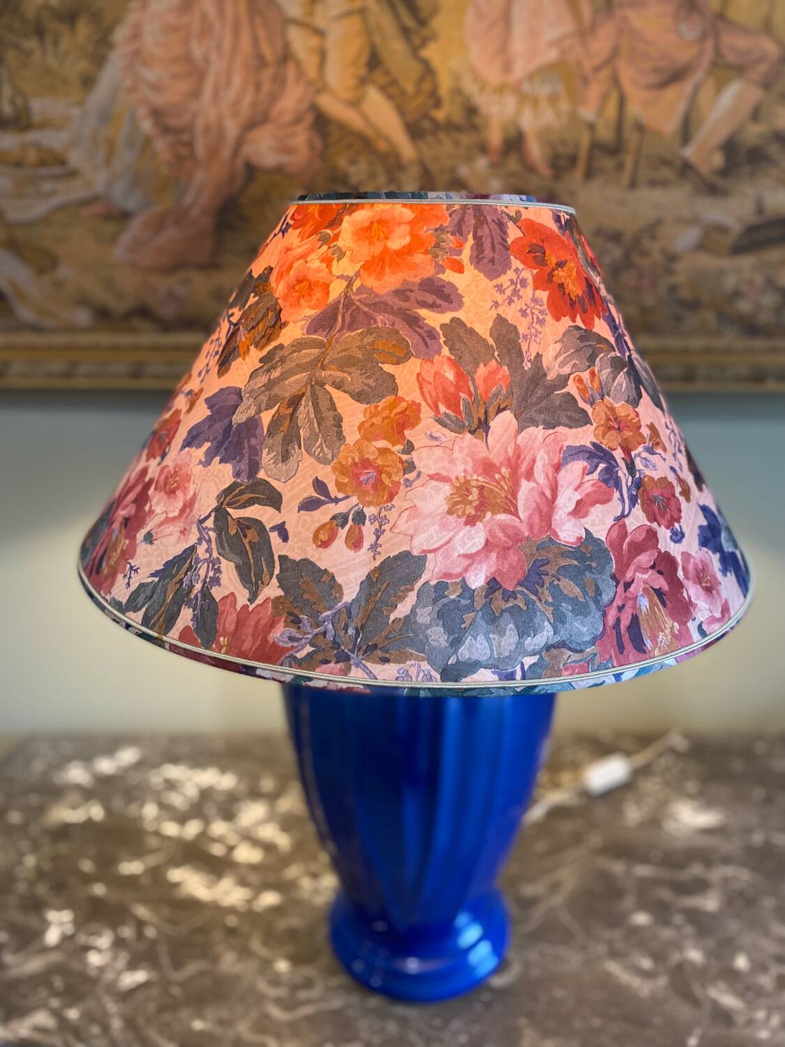 Large blue ceramic lamp with floral shade