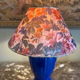 Large blue ceramic lamp with floral shade