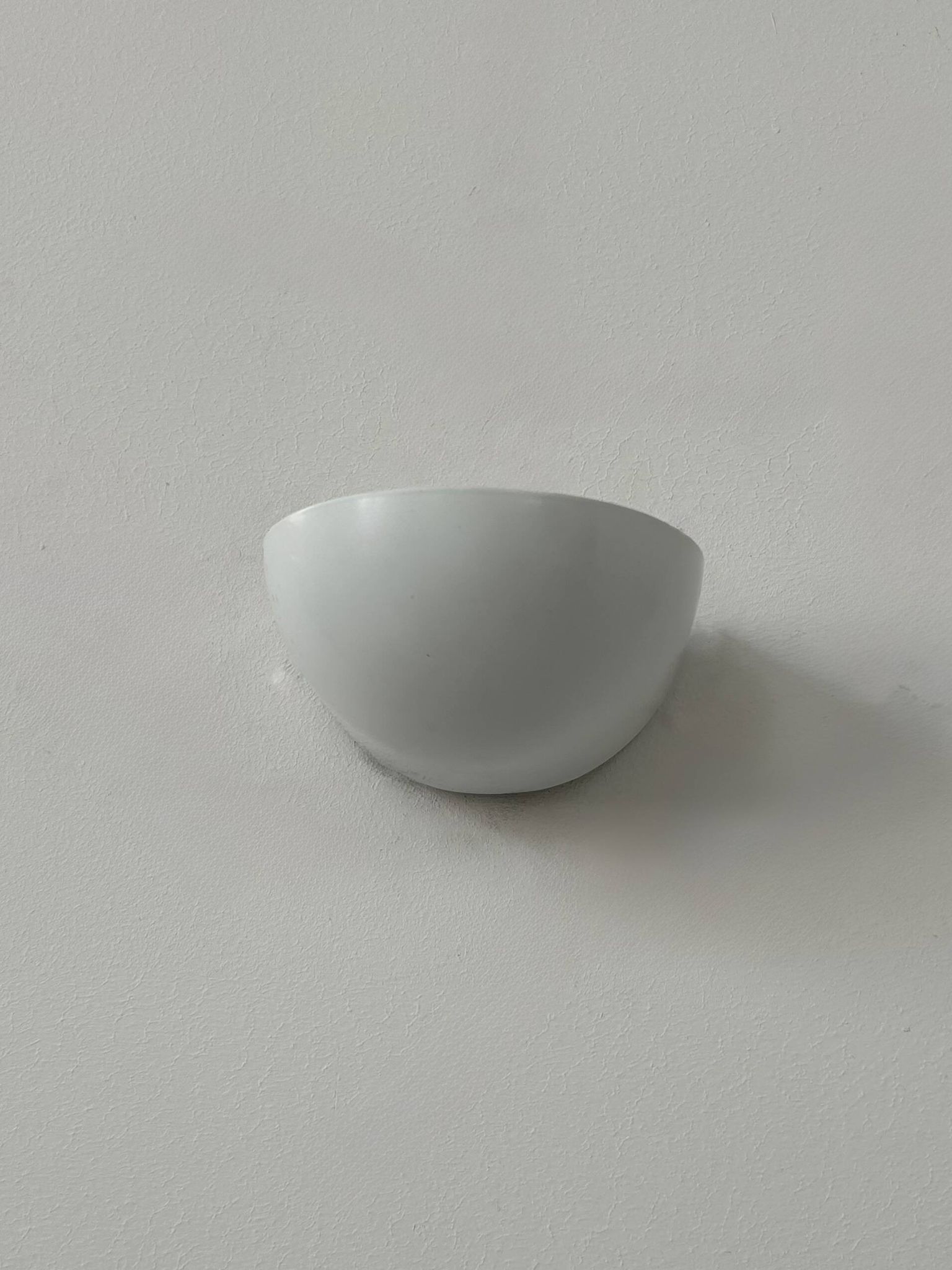 Pair of vintage wall lights in matte white lacquered metal, Italy, 1980.