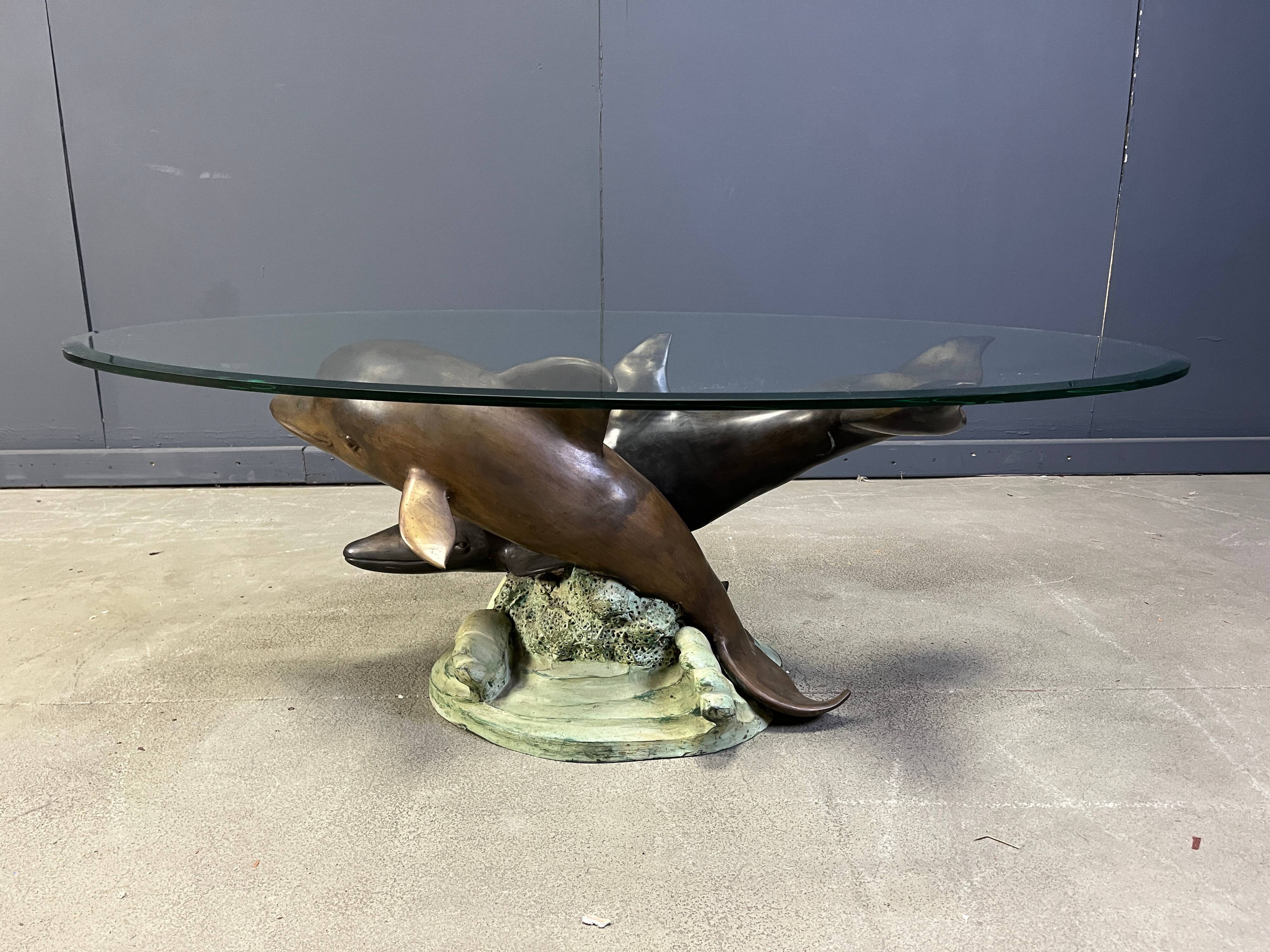 Bronze dolphin coffee table signed C Caudion, 1960s