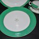 Paris porcelain set of 3 plates and a sauce boat with green border and gold monogram JC.
