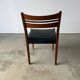 Set of 6 Scandinavian design chairs in solid teak and black Skai.
