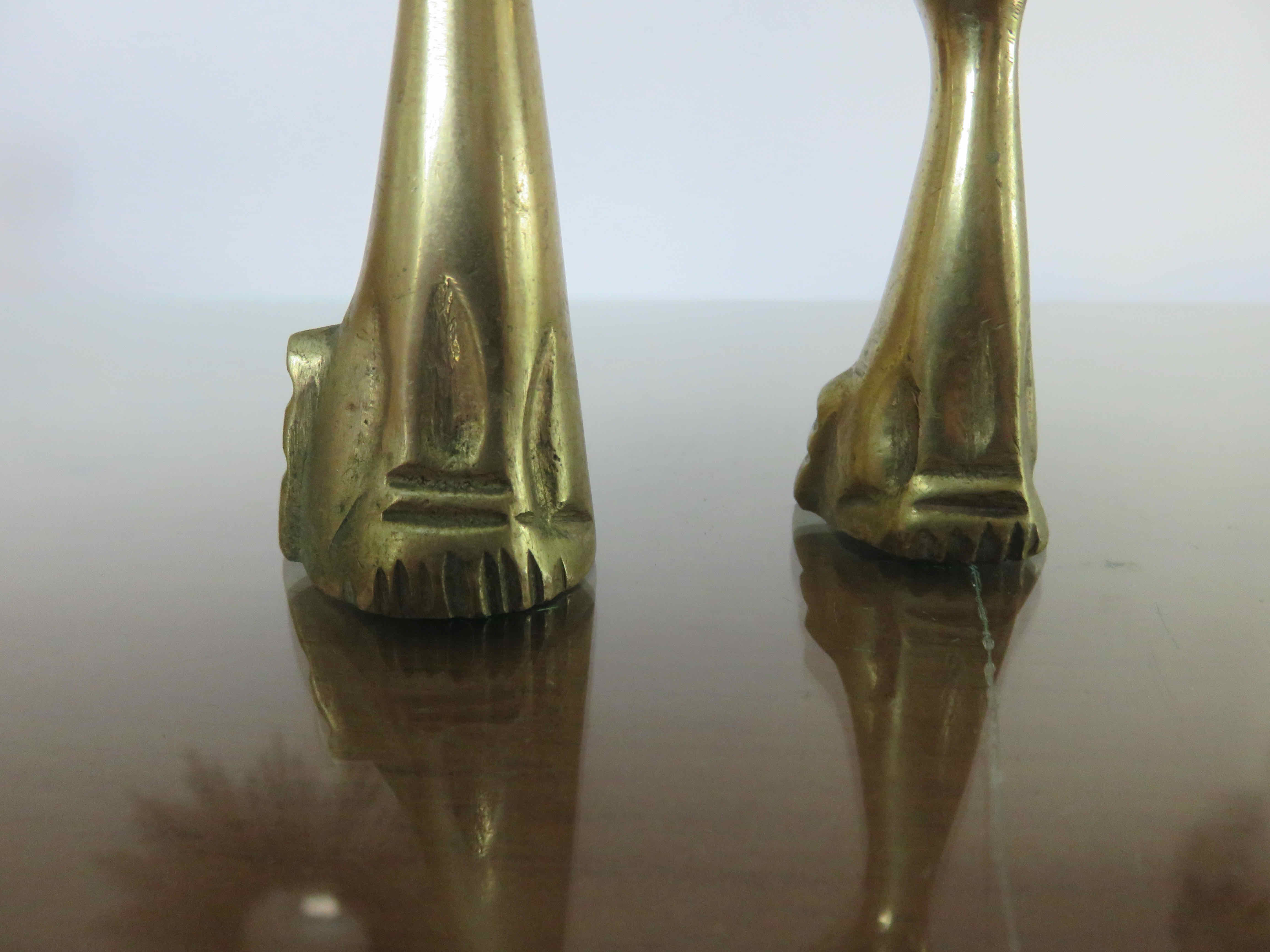 Couple of stylized cats in brass 70s