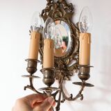 Pair of old French wall lights with beveled mirror and putti