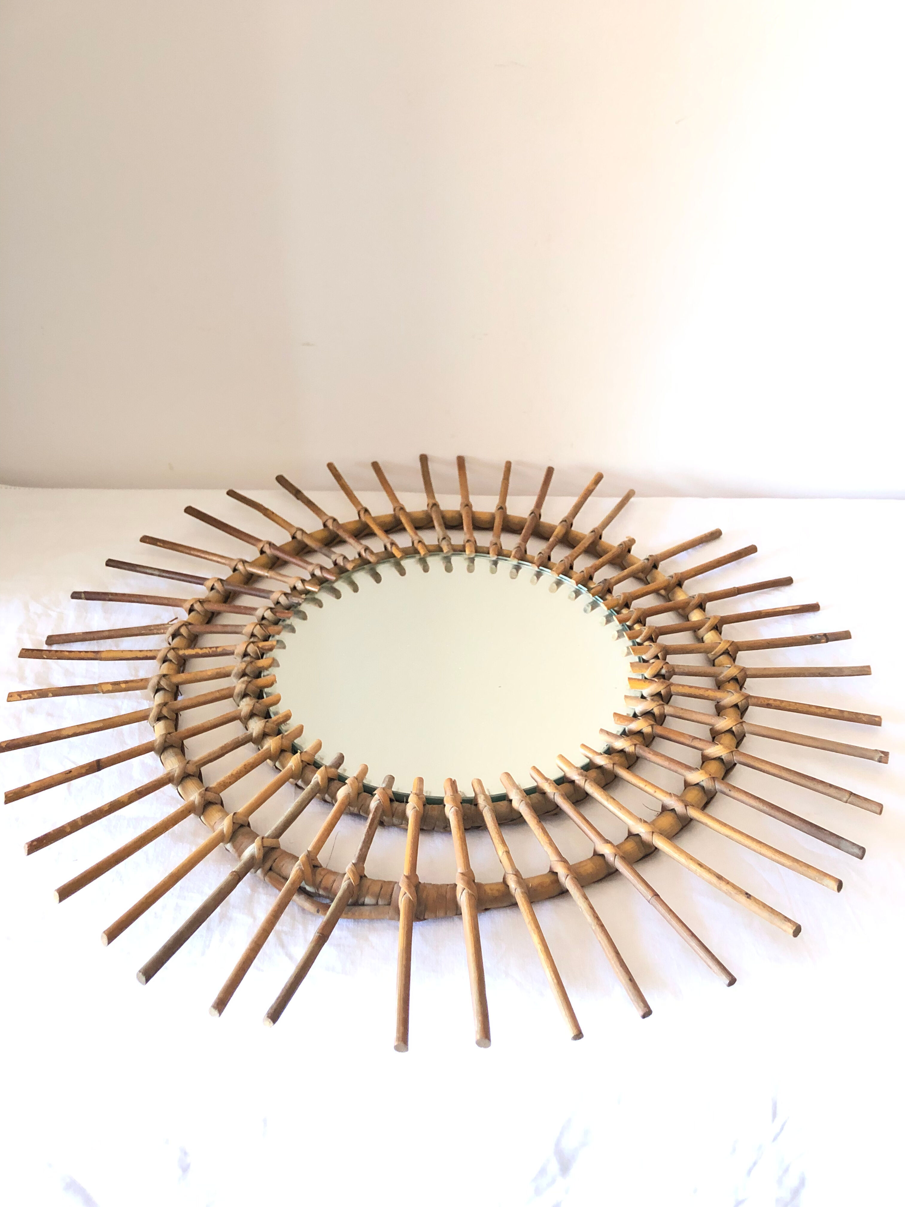 Vintage wicker rattan sun mirror