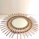 Vintage wicker rattan sun mirror