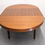 Scandinavian round extendable teak table, 60s-70s