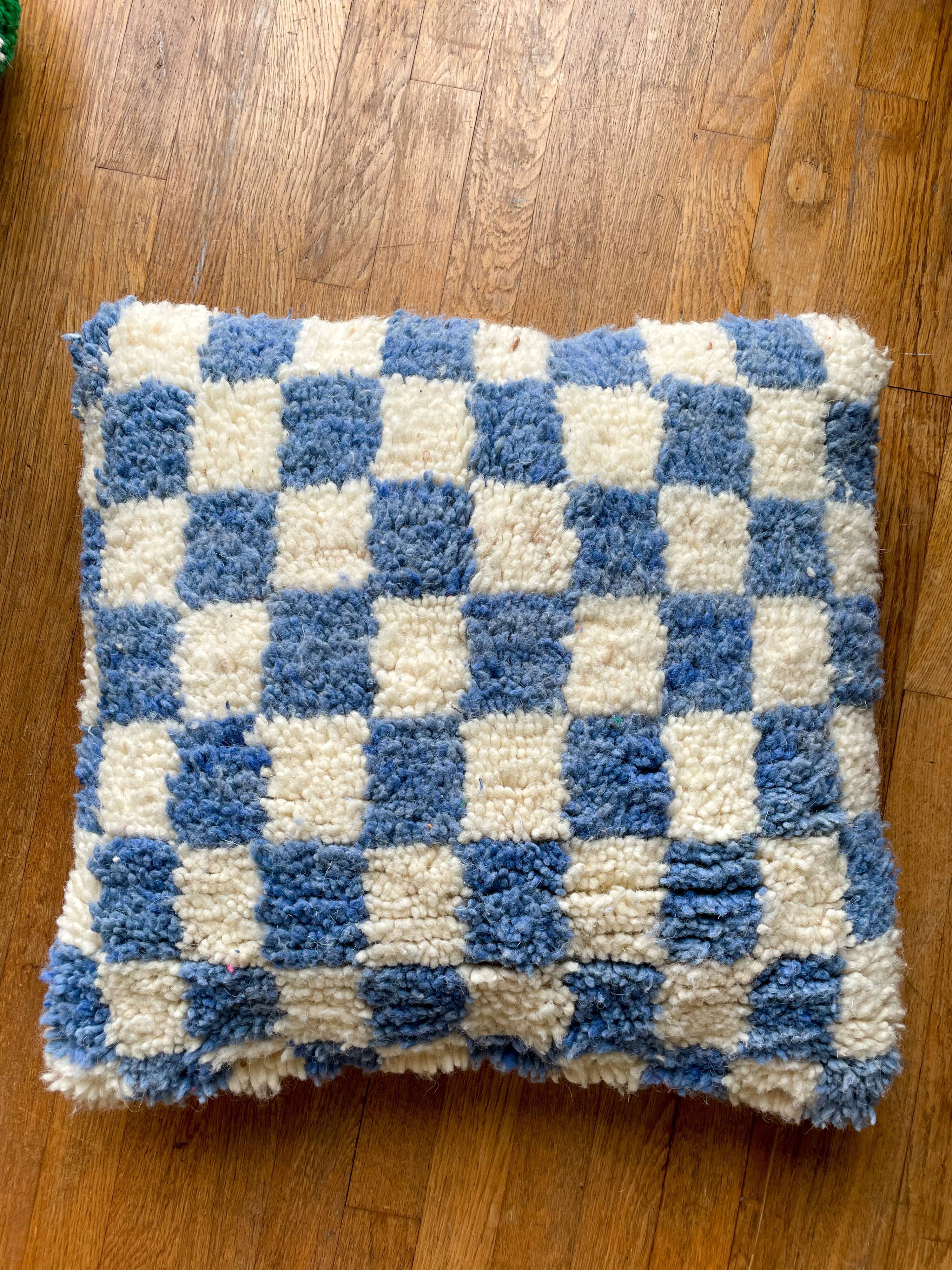 Sky blue and white checkered wool cushion