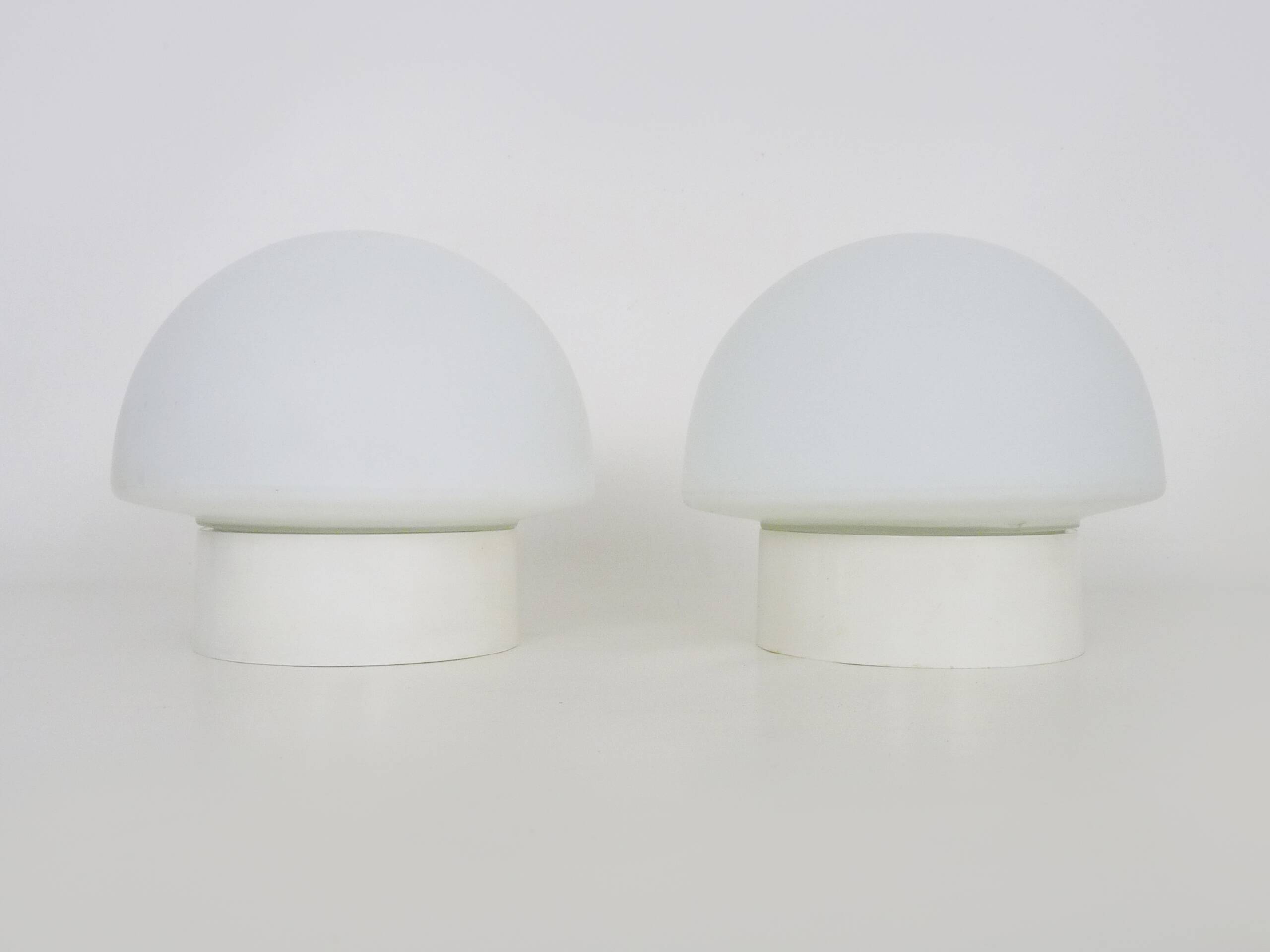 Pair of white mushroom-shaped wall lights. 1970s